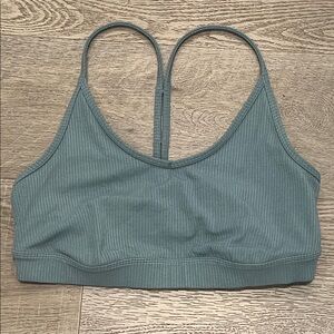 ALO BLISSfUL BRA RIBBED BLUE SIZE LARGE
SPORTS BRA